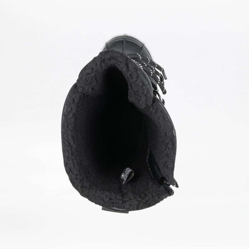 Top view of the Black BILLY Ice Boot by BILLY Footwear shows a thick fleece-like lining, side laces, and a partially visible interior tag. These kids' waterproof insulated boots are ideal for winter. Shown on a plain white background.