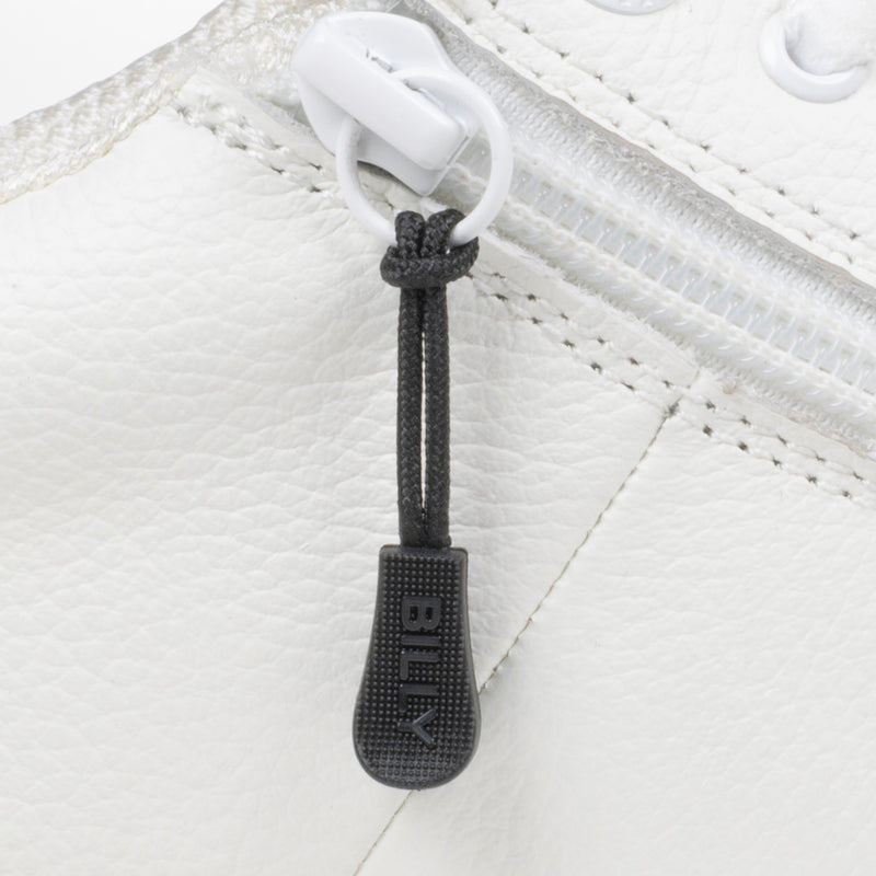 Black sport zipper pull with BILLY word mark attached to a white sneaker