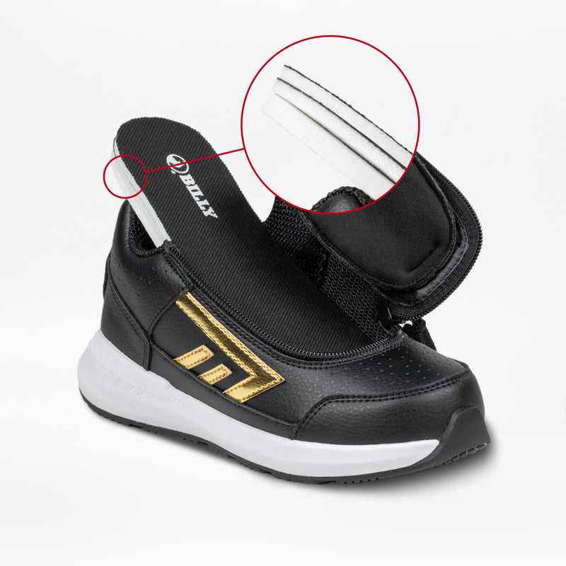 The Black/Gold BILLY Goat Hoop by BILLY Footwear is a kids’ adaptive sneaker with gold accents, a white sole, and an unzipped upper. A circular inset shows its white closure with black stitching detail.