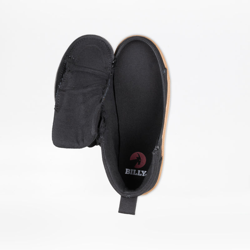The Black/Gum BILLY CS High by BILLY Footwear is a kids’ high top sneaker with a tan sole, shown from above. Its upper has a full wrap zipper, unzipped and folded open to reveal an insole featuring the white and red BILLY logo.
