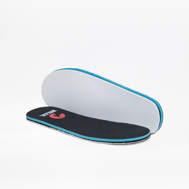 Two black and white removable insoles with blue edges from BILLY Footwear are displayed—one flat, black side up, and one standing to show the white underside—designed for the Black/White BILLY Classic Lace High with a wraparound zipper.