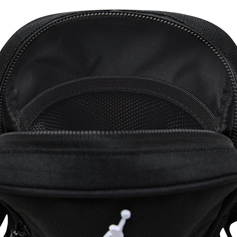 Blacktop festival bag close-up: black mesh front, zip trim, Jordan logo