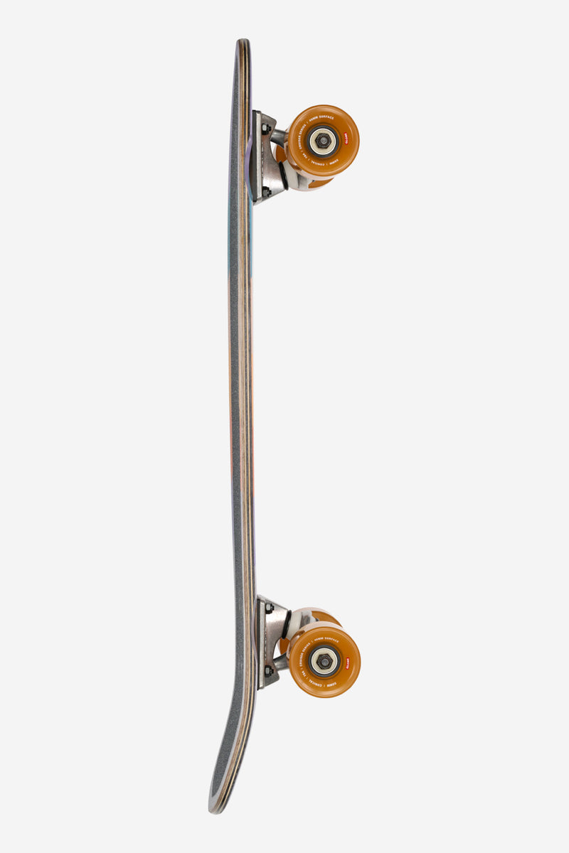 Side profile of the Far Out 26 longboard showing orange wheels and exposed wood grain deck with trucks