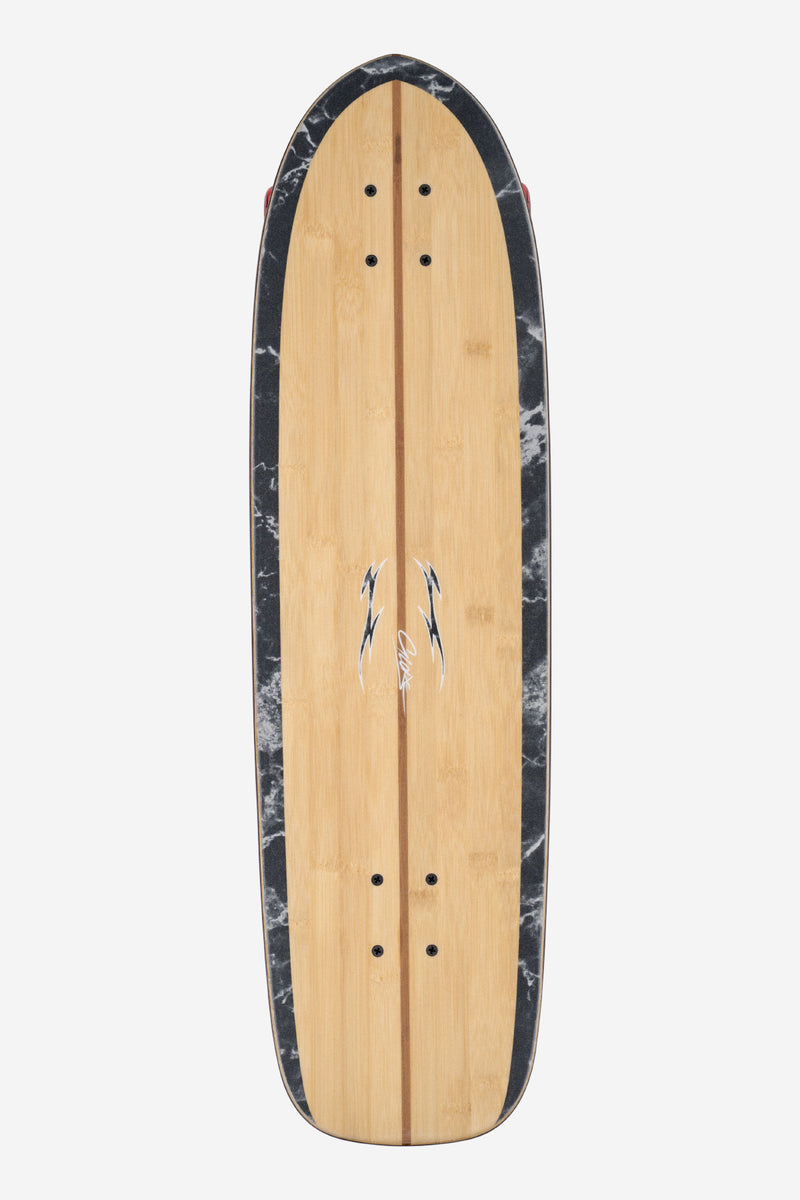 Top view of a 32 inch Blazer Fuego bamboo longboard with natural deck and a black marble edge.
