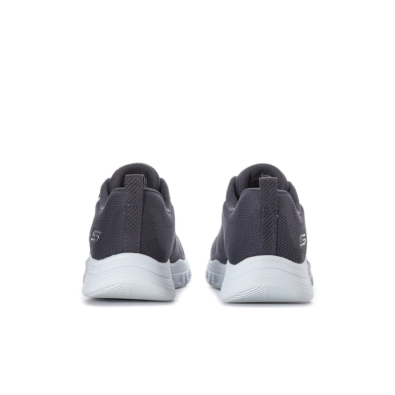 Dark navy knit sneakers, heel and back view with white midsole