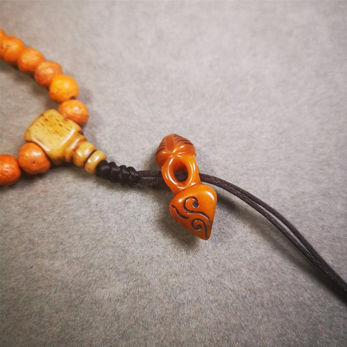 Bone Phurba Amulet 1.18" - Tibetan Buddhist amulet, front view