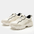 Boom Joy Unbleached Lined shoe on a lightweight EVA Boom Joy outsole. | Tan lace up shoe with black lining.