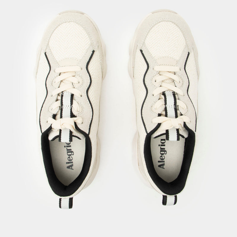 Boom Joy Unbleached Lined shoe on a lightweight EVA Boom Joy outsole. | Tan lace up shoe with black lining.