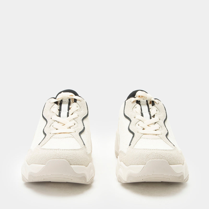 Boom Joy Unbleached Lined shoe on a lightweight EVA Boom Joy outsole. | Tan lace up shoe with black lining.