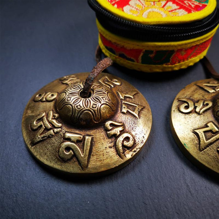 Brass Tingsha Set - OM Mantra - 2.9" - Tibetan Buddhist art, close-up detail