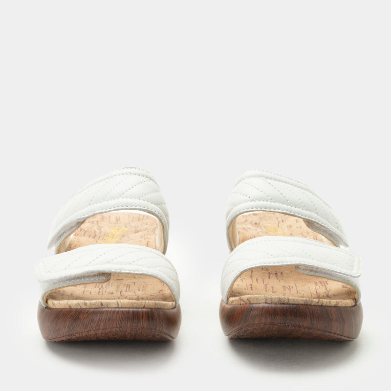 Brayah White adjustable sandal with non-flexing sleek rocker bottom with built in arch support
