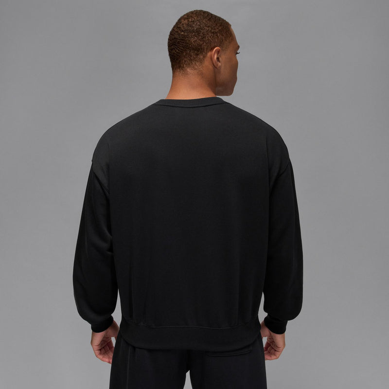 Black crewneck sweatshirt back view with ribbed hem and cuffs