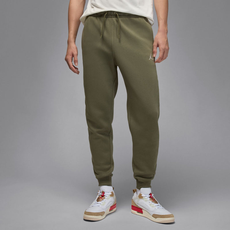 Men's medium olive fleece joggers with elastic cuffs and tapered ankle fit