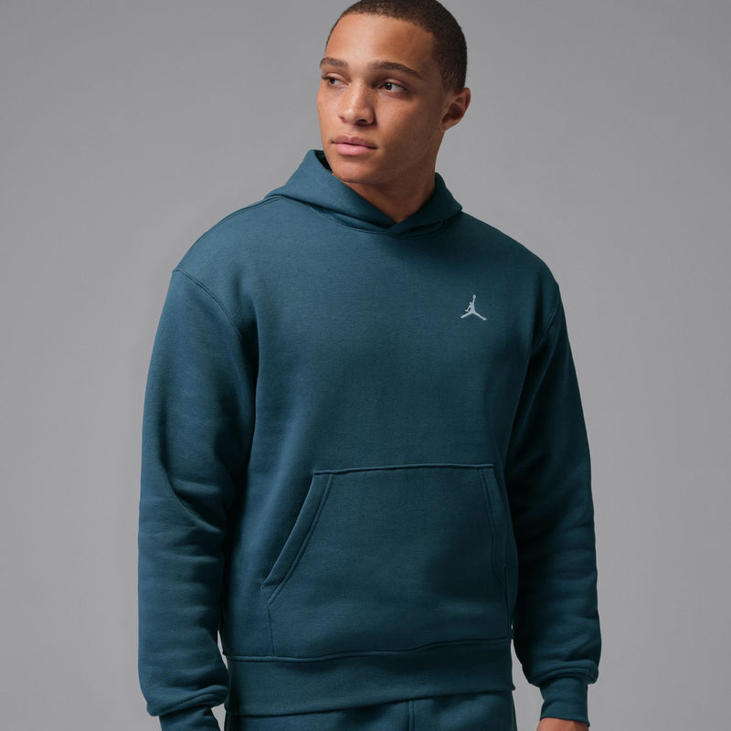Men's squadron blue fleece pullover hoodie with hood and small Jumpman logo at chest.