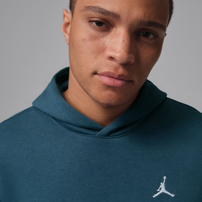 Men's squadron blue fleece hoodie close-up with hood and white Jumpman logo.
