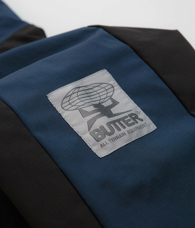 Butter Goods Contour Anorak Jacket in Navy and Black