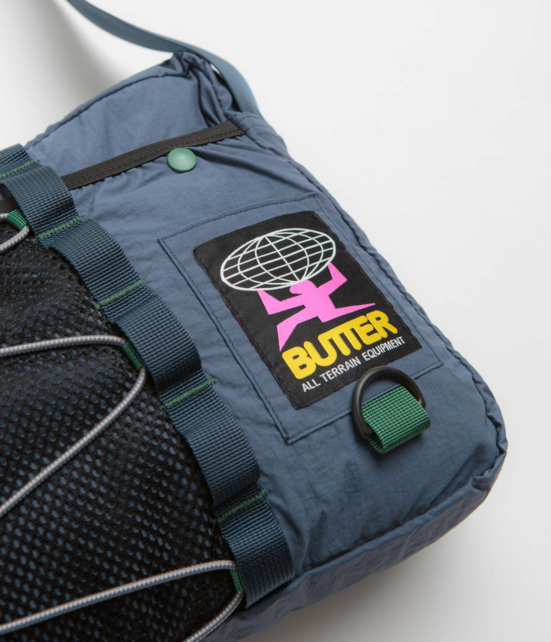 Butter Goods Express Side Bag in Navy and Green