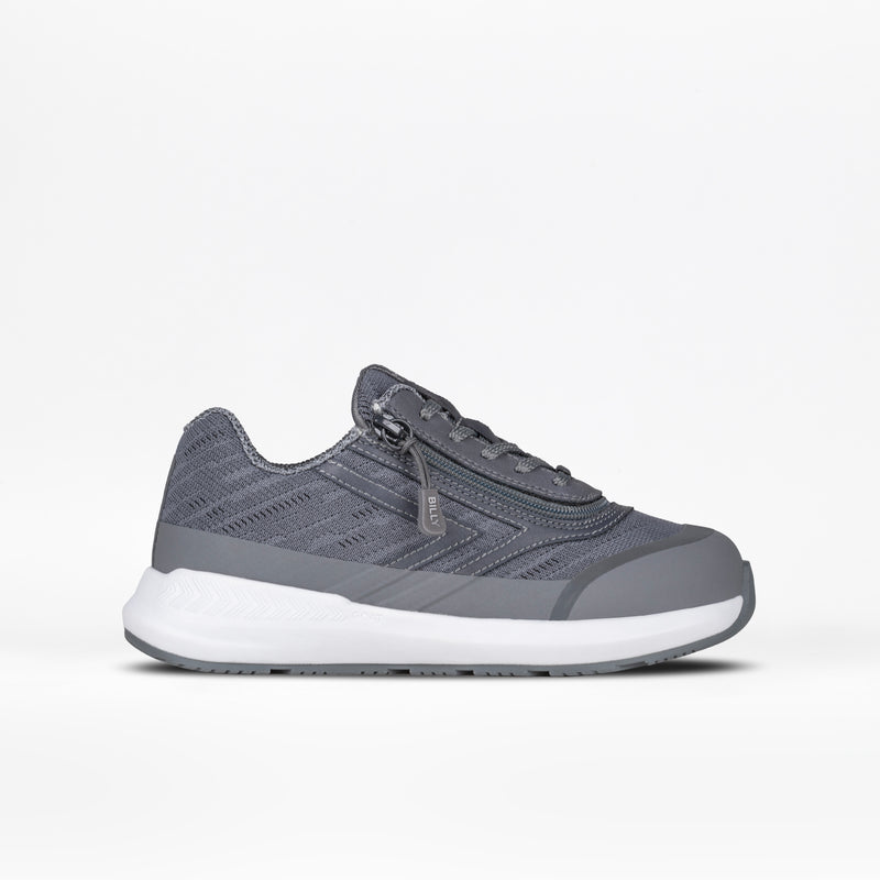 The Charcoal BILLY Goat by BILLY Footwear features a patterned gray mesh upper, gray laces, an easy-access zipper for AFO-friendliness, and a thick white sole—shown on a plain white background.