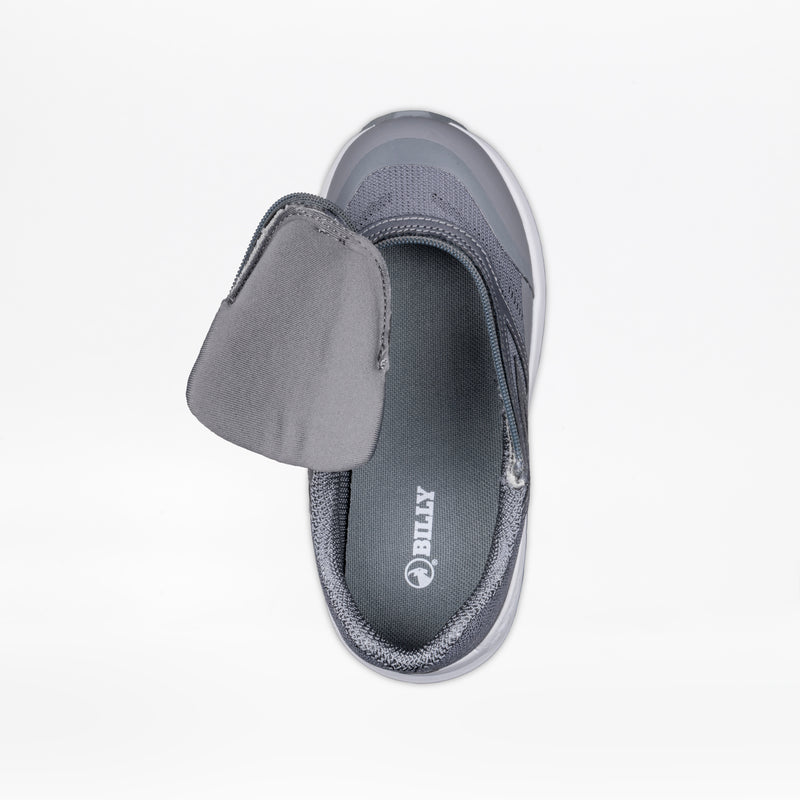 A Charcoal BILLY Goat from BILLY Footwear is shown from above, with its upper flap partially unzipped to display the insole and interior, highlighting its adaptive design and easy on-and-off zipper.