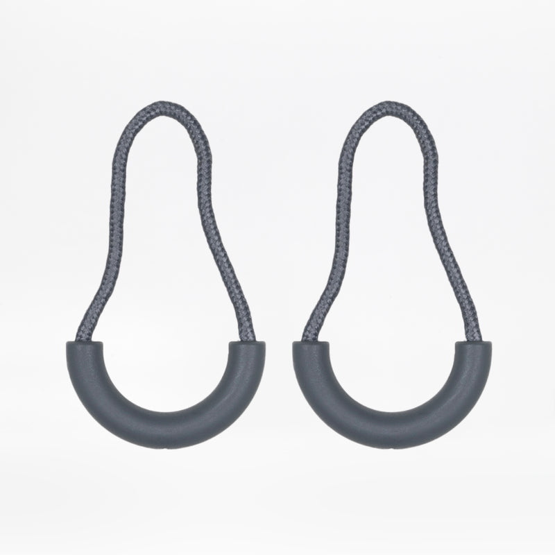 Two charcoal zipper pulls with rubber half loops and charcoal cord on a white background