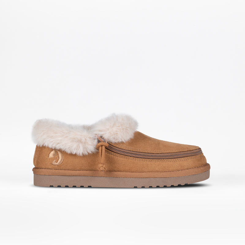 The Chestnut BILLY Cozy Slipper by BILLY Footwear features a fluffy white faux fur lining, side zipper detail, and a flat rubber sole for women. Displayed on a white background.