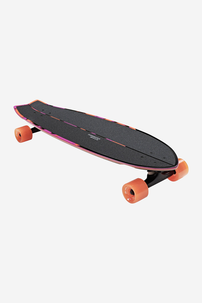 Chromantic Cruiserboard 33 Sea Devil resin-7 maple swallow-tail cruiser with black grip and orange wheels.