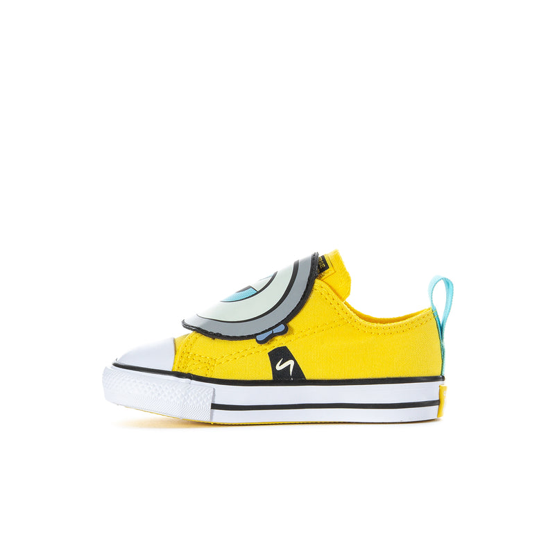 Toddler one-strap sneaker, angled front: yellow upper, character strap, black detail, white sole