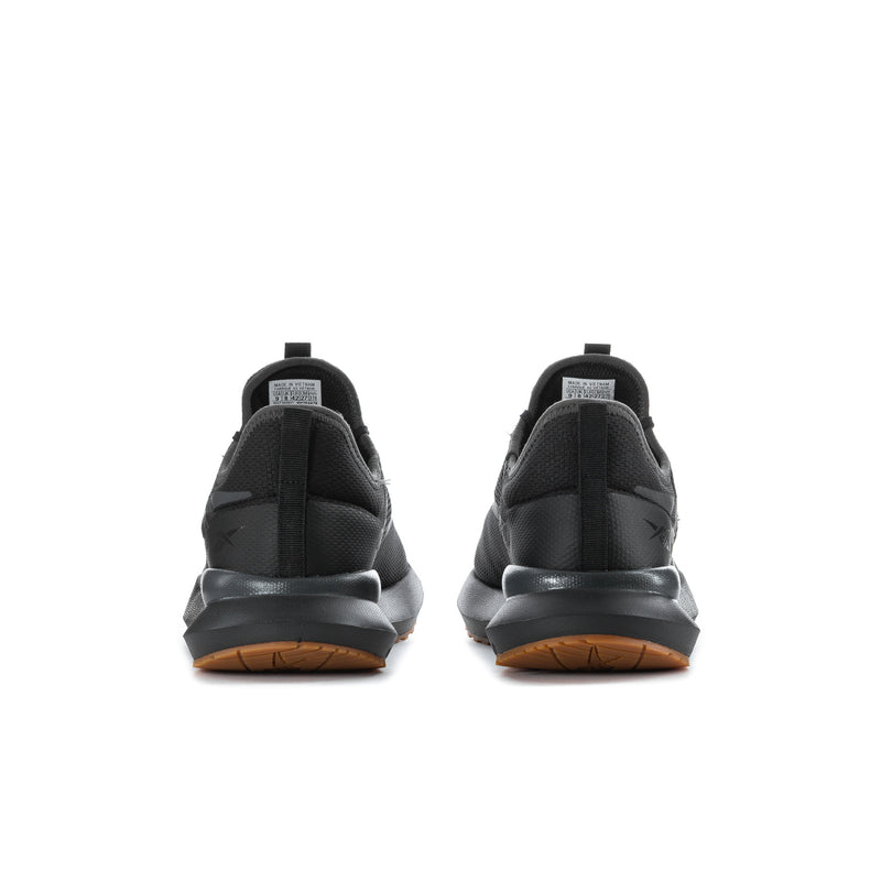 Men's black sneakers rear view with pull tab and gum outsole strip