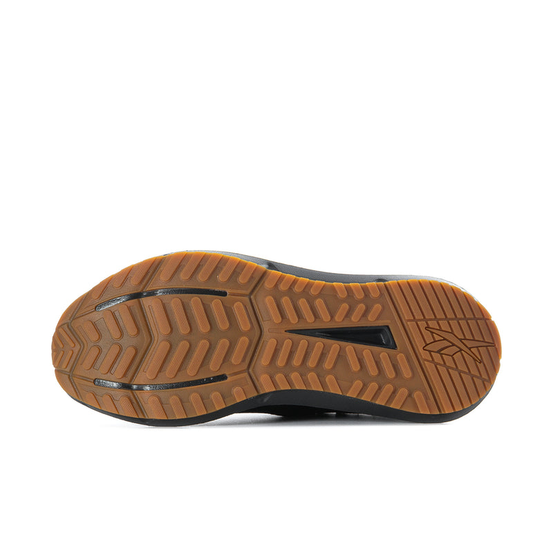 Men's black sneaker outsole tread with brown rubber pattern