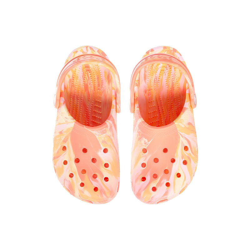 Pair of kids' clogs in pink-orange marble with textured footbed and circular traction pods