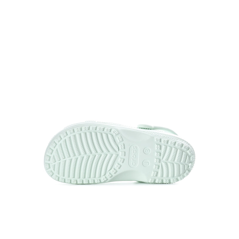 Kids' white clog outsole with tread pattern and heel strap detail