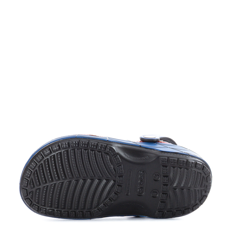 Kids classic clog outsole view with blue rim and dark tread pattern