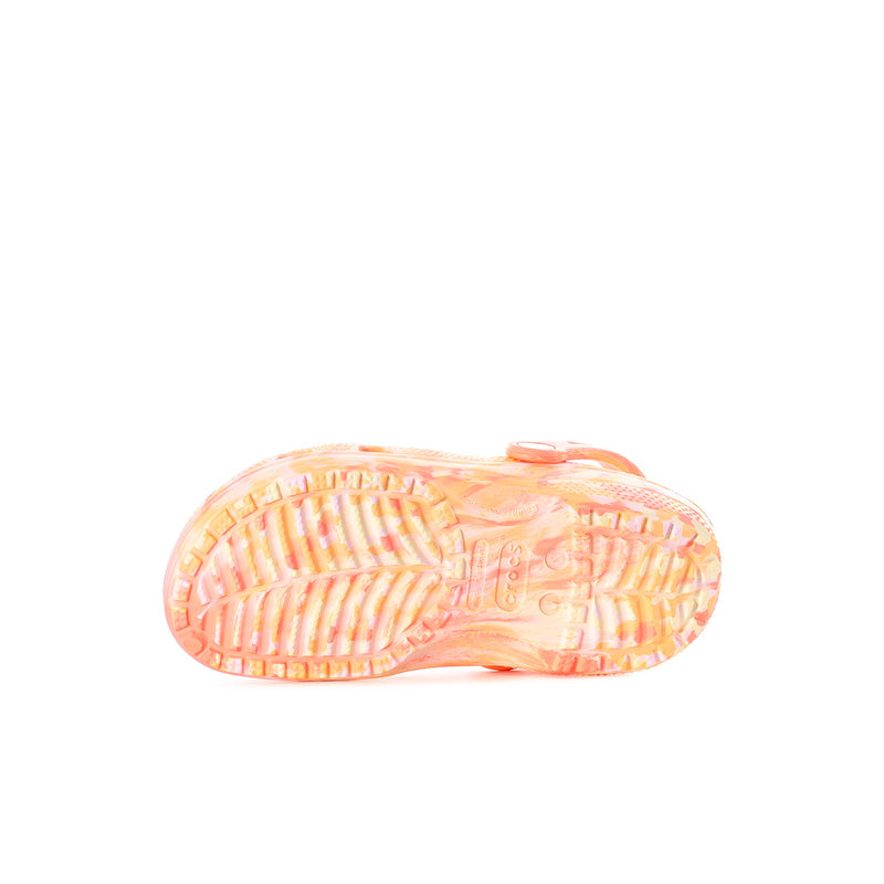 Kids' clog outsole in pink-orange marble with textured tread and molded traction pattern