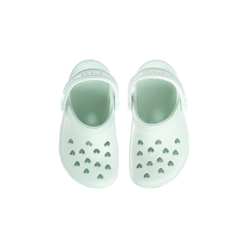 Toddler light mint clogs with sage raindrop pattern on the front