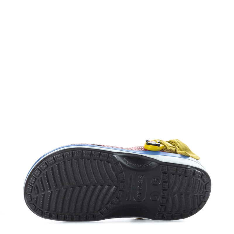 Youth clog outsole with black rubber tread pattern and side logo detailing