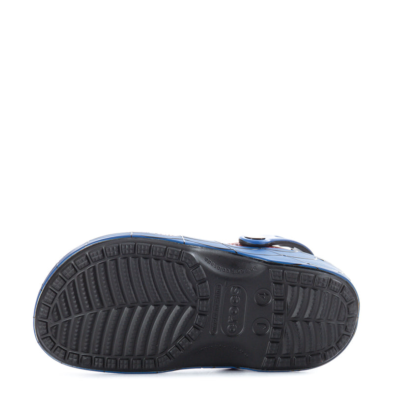 Youth classic clog outsole view, dark textured rubber tread with logo