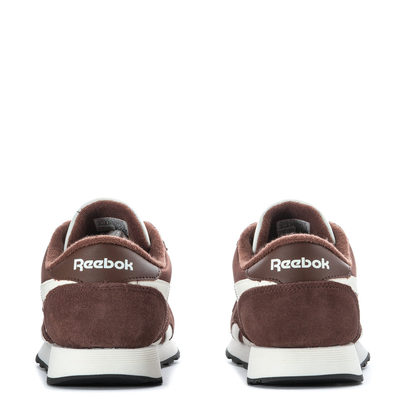 Men's brown sneakers with Reebok heel tab, white midsole, and lace-up design