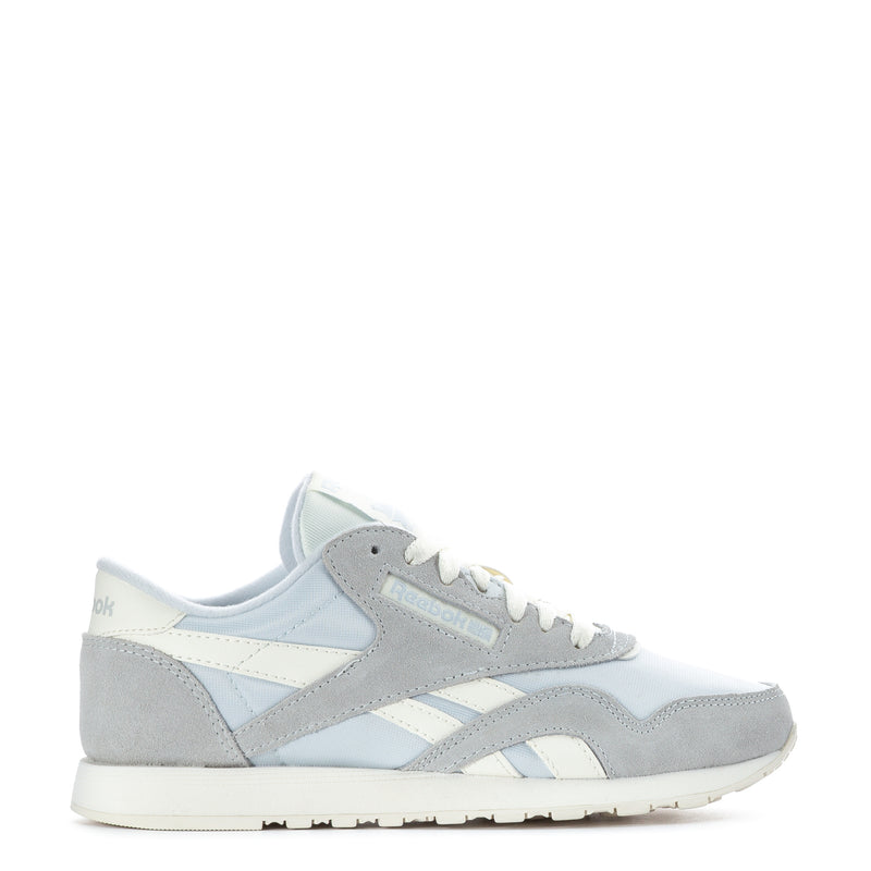 Women's low-top sneakers in light blue, gray, and white with lace-up front