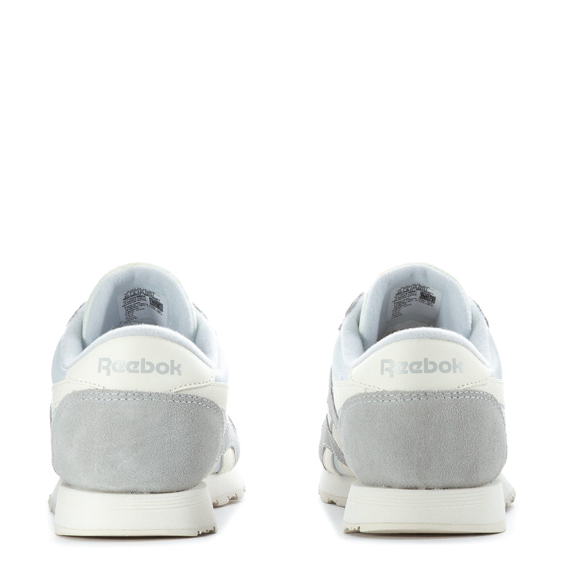 Back view of women's low-top sneakers in light gray with white midsole and heel tab