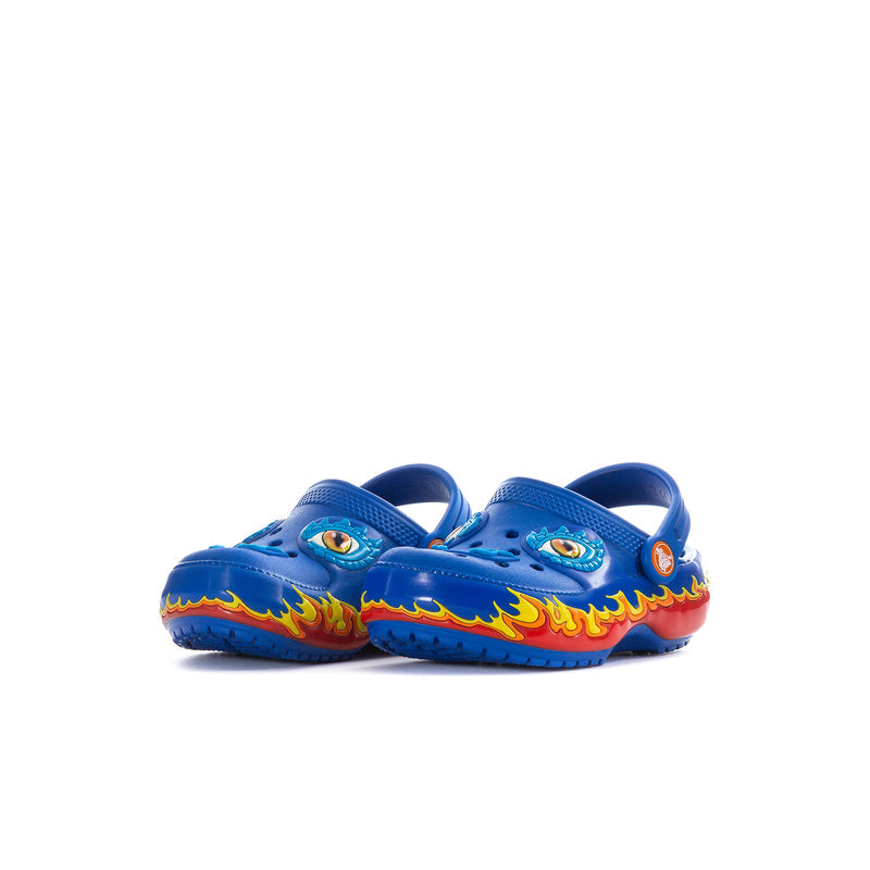 Toddler blue clogs, side view with flame graphic and cartoon face details