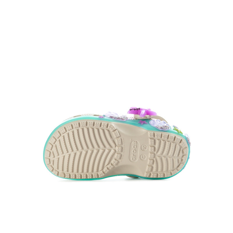 Toddler clog outsole with textured tread, teal edge, and visible purple heel accent