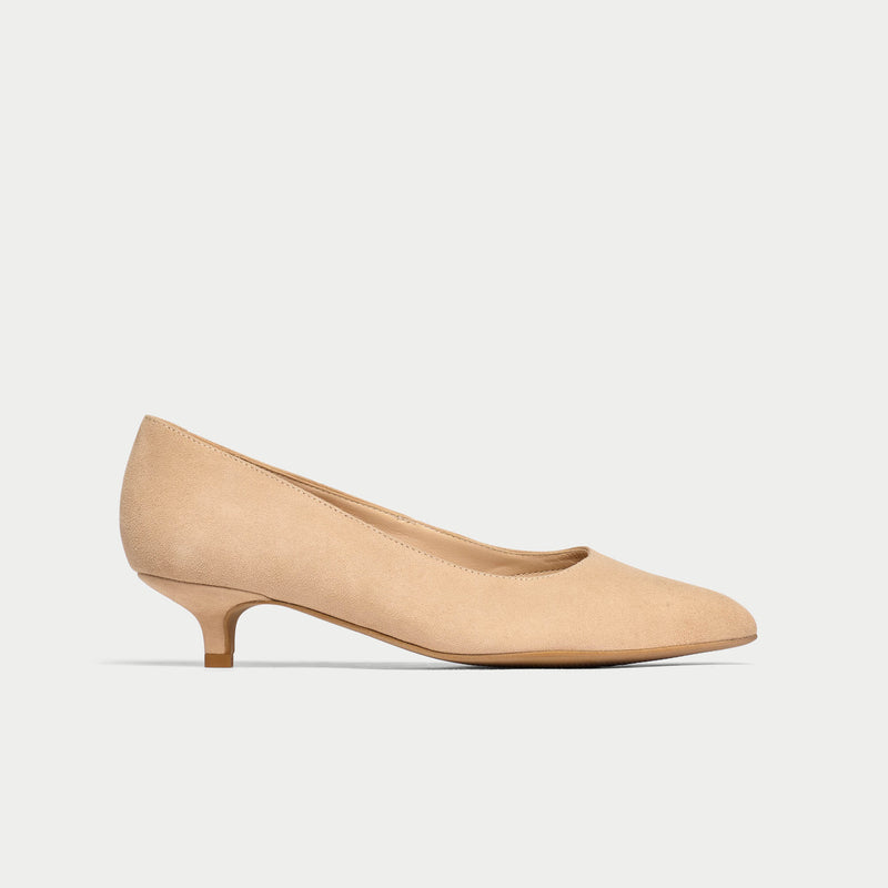 Beige shoe on a light gray background
