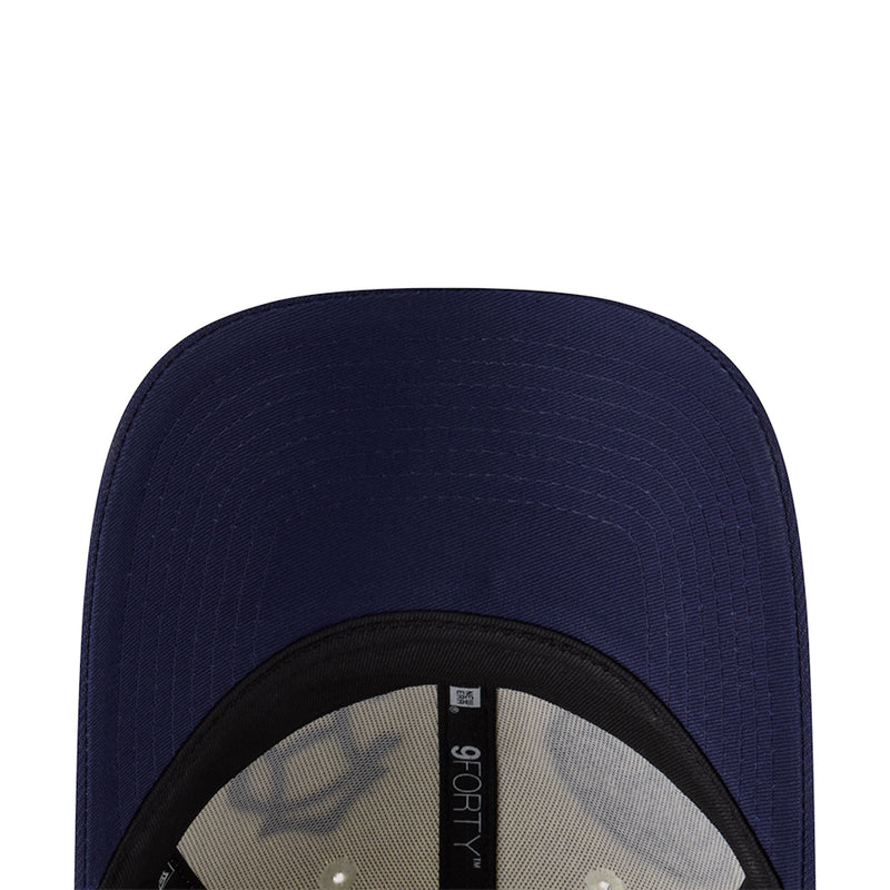 Two-tone baseball cap crown close-up in dark navy with interior logo patch