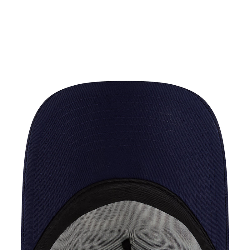 Navy trucker cap interior view with black brim edge detail