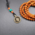 Conch Amulet 0.98" - Tibetan Buddhist amulet, front view