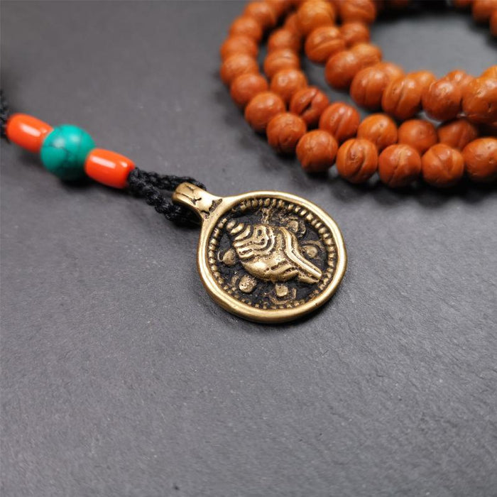 Conch Amulet 0.98" - Tibetan Buddhist amulet, detailed view