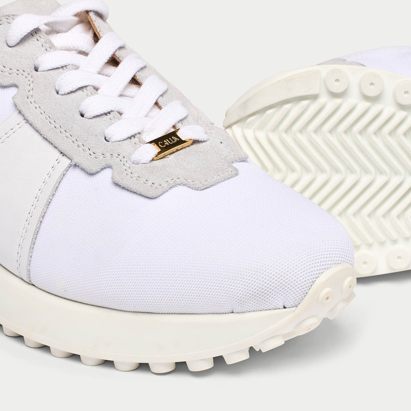 Cosmos white trainers tip view
