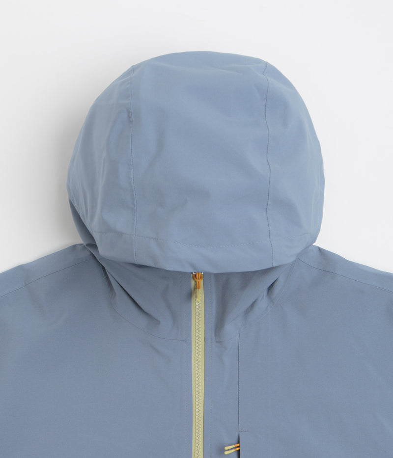 Cotopaxi Cielo Rain Jacket in Tempest and Moss