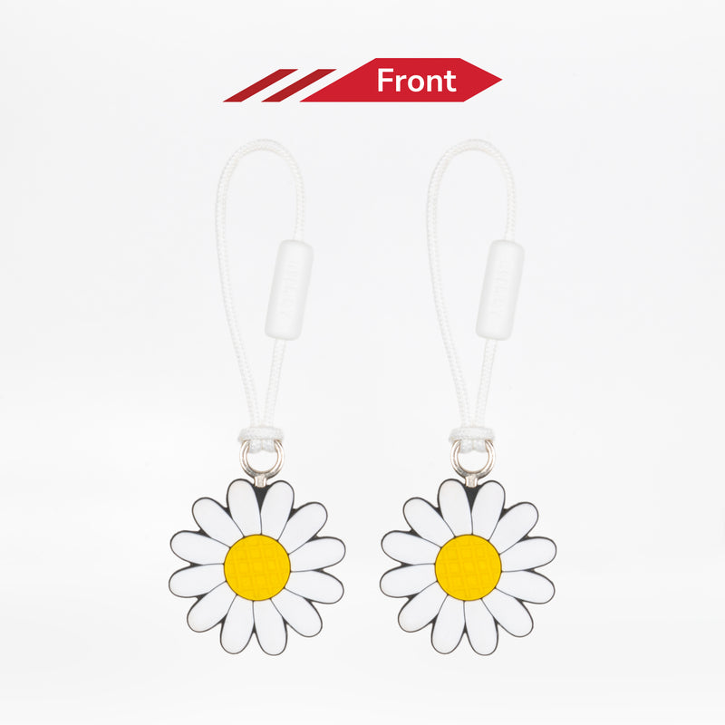 Two daisy-shaped keychains with yellow centers on a white background