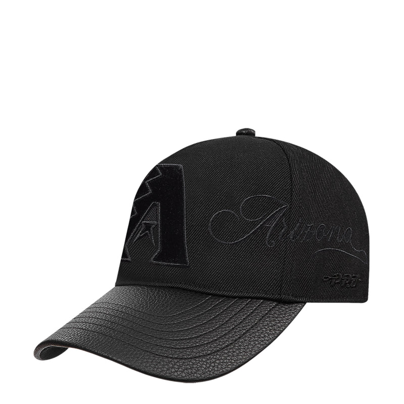 Black snapback cap with embroidered A logo and cursive script on side